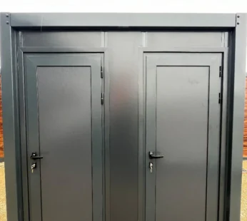 Szary kontener sanitarny z WC, umywalką i prysznicem